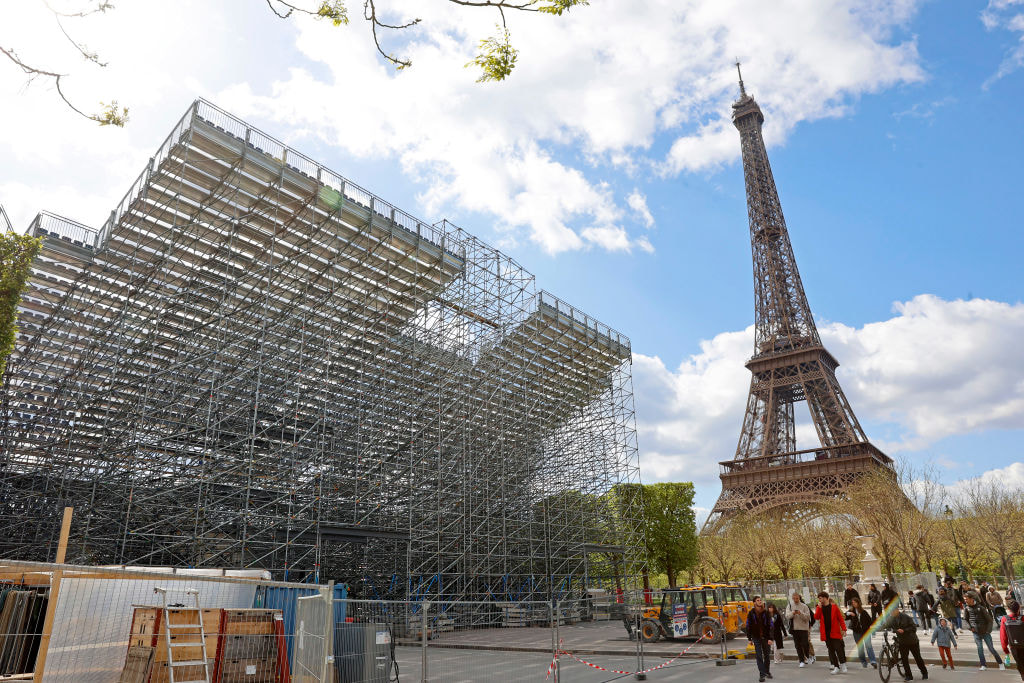 Construction work on temporary grandstands is underway on the site of the Eiffel Tower in preparation for the Paris 2024 Olympic Beach Volleyball event.